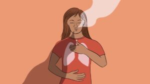 Client learning breathing through somatic therapy in therapy.