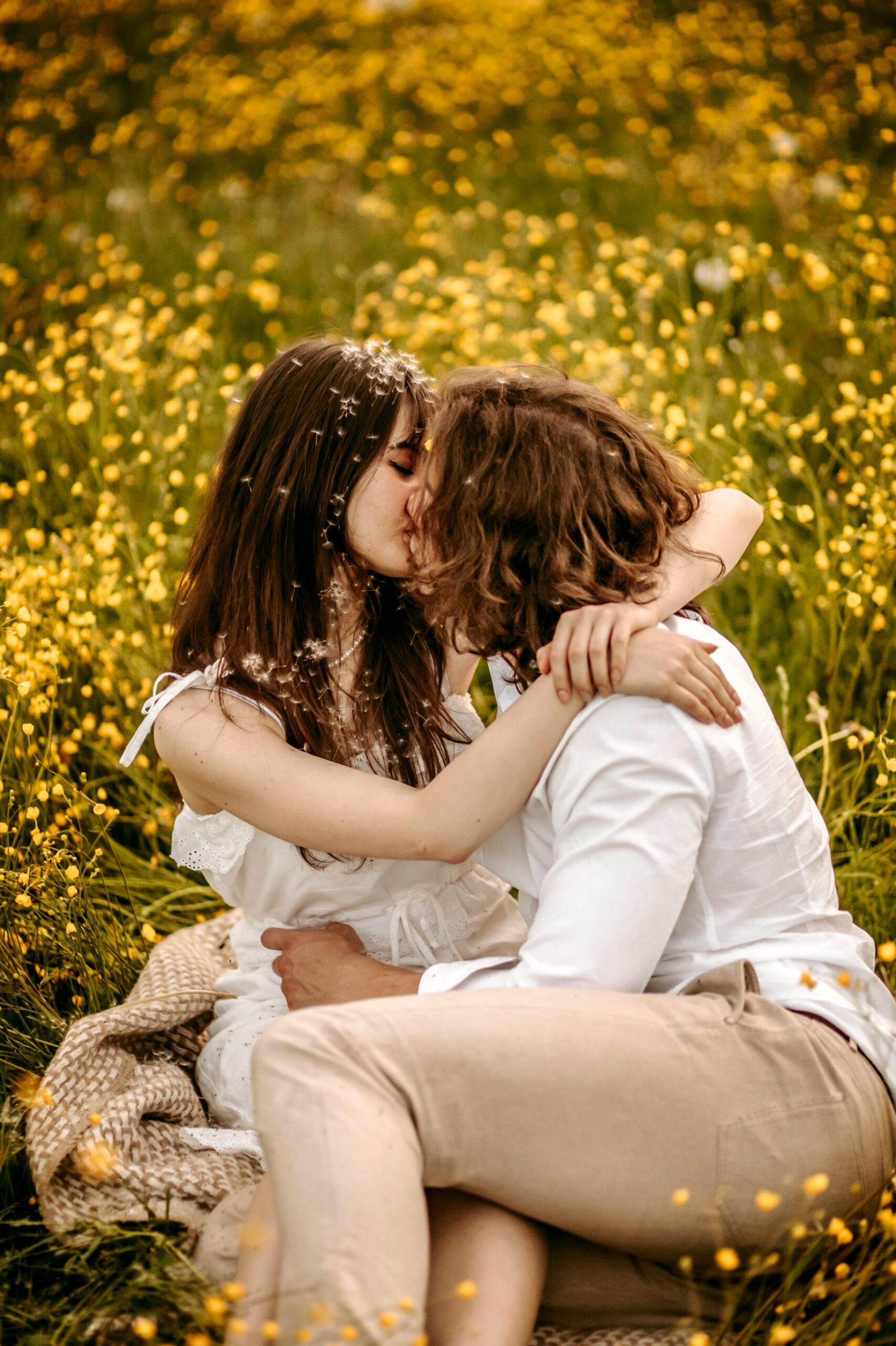 Couple holding each other and sharing a gentle kiss in Wakefield, MA, representing healthy relationships and couples counseling support.