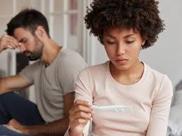 Woman upset at a negative pregnancy test looking for therapy to deal with infertility.